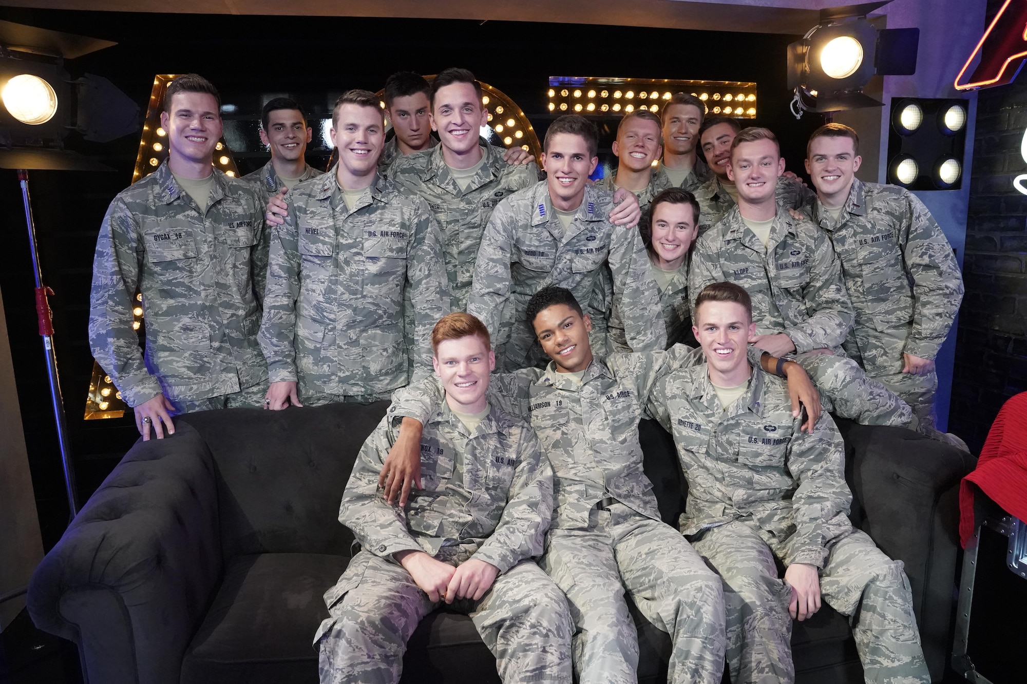 Members of the In the Stairwell pose in the lounge during the Quarter Finals of America’s Got Talent. For each performance on AGT, the group wears a different Air Force uniform. (Courtesy photo by Kevin Polizzotto)