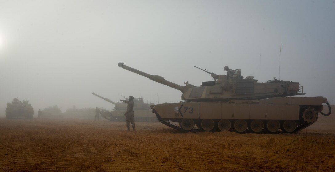 U.S. Army Soldiers from the 2nd Battalion, 7th Cavalry Regiment, 3rd Armored Combat Team, 1st Cavalry Division prepare several M1A2 Abrams tanks for a field training exercise during Bright Star 2017, Sept. 12, 2017, at Mohamed Naguib Military Base, Egypt. Bright Star was last held in 2009 with more than 15 countries and 15,000 participants. (U.S. Air Force photo by Staff Sgt. Michael Battles)
