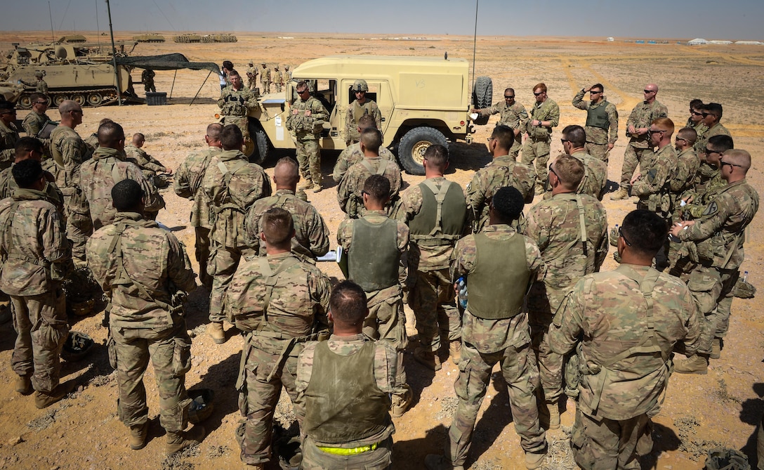 Soldiers from the 2nd Battalion, 7th Cavalry Regiment, 3rd Armored Combat Team, 1st Cavalry Division attend a post field-training exercise brief during Bright Star 2017, Sept. 12, 2017, at Mohamed Naguib Military Base, Egypt. Bright Star 2017 centralizes around regional security and cooperation, and promoting interoperability in conventional and irregular warfare scenarios. (U.S. Air Force photo by Staff Sgt. Michael Battles)