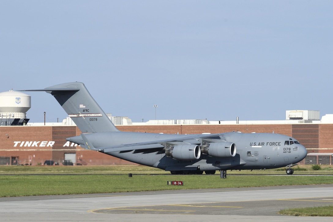 A C-17A Globemaster III takes off from Tinker Air Force Base