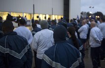 U.S. Airmen assigned to the 521st Air Mobility Operations Wing stand in formation during the Tri-Wing POW/MIA Memorial Run on Ramstein Air Base, Germany, Sept. 13, 2017. According to the Defense POW/MIA Accounting Agency, since World War II more than 82,000 service members have been declared missing in action. (U.S. Air Force photo by Senior Airman Tryphena Mayhugh)