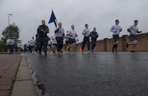 U.S. Airmen assigned to the 86th Airlift Wing, 521st Air Mobility Wing, and 435th Air Ground Operations Wing, participate in the Tri-Wing POW/MIA Memorial Run on Ramstein Air Base, Germany, Sept. 13, 2017. The run was approximately three miles and was held in honor of past and present prisoners of war and missing in action service members. (U.S. Air Force photo by Senior Airman Tryphena Mayhugh)