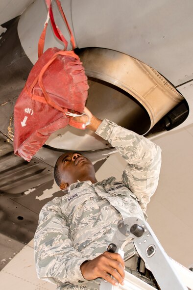 U.S. Air Force Reserve Staff Sgt. Kquawme Akins, a crew chief assigned to the 913th Maintenance Squadron removes a exhaust cover on a C-130J Super Hercules helping to prepare it for hurricane support missions Sept. 9, 2017, at Little Rock Air Force Base, Ark. Hurricanes Harvey and Irma have devastated portions of the Gulf Coast and aircraft and personnel from Little Rock AFB have joined in the effort to provide assistance following the natural disasters. (U.S. Air Force photo by Master Sgt. Jeff Walston)