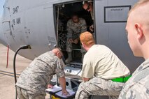 U.S. Air Force Reserve members from the 913th Maintenance Squadron and their active duty partners in the 19th Maintenance Group review write-ups to ensure a C-130J Super Hercules is cleared to fly hurricane support missions Sept. 9, 2017, at Little Rock Air Force Base, Ark. Hurricanes Harvey and Irma have devastated portions of the Gulf Coast and aircraft and personnel from Little Rock AFB have joined in the assistance efforts. (U.S. Air Force photo by Master Sgt. Jeff Walston)