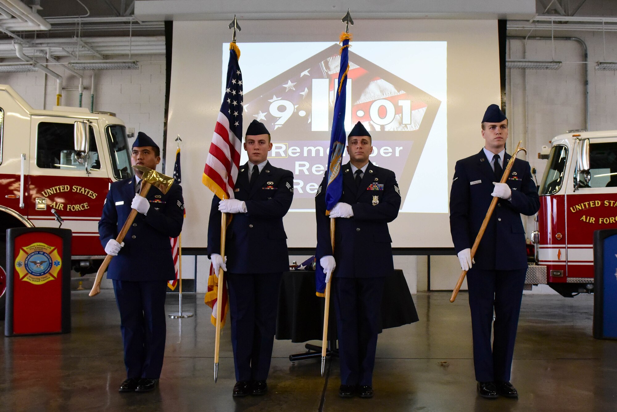 Members of the 4th Fighter Wing Fire Department present the colors during a 9/11 Remembrance Ceremony, Sept. 11, 2017, at Seymour Johnson Air Force Base, North Carolina. Seymour Johnson AFB and Americans across the United States took time to pay homage to those who lost their lives in the deliberate and vicious terrorist attacks. (U.S. Air Force photo by Airman 1st Class Victoria Boyton)