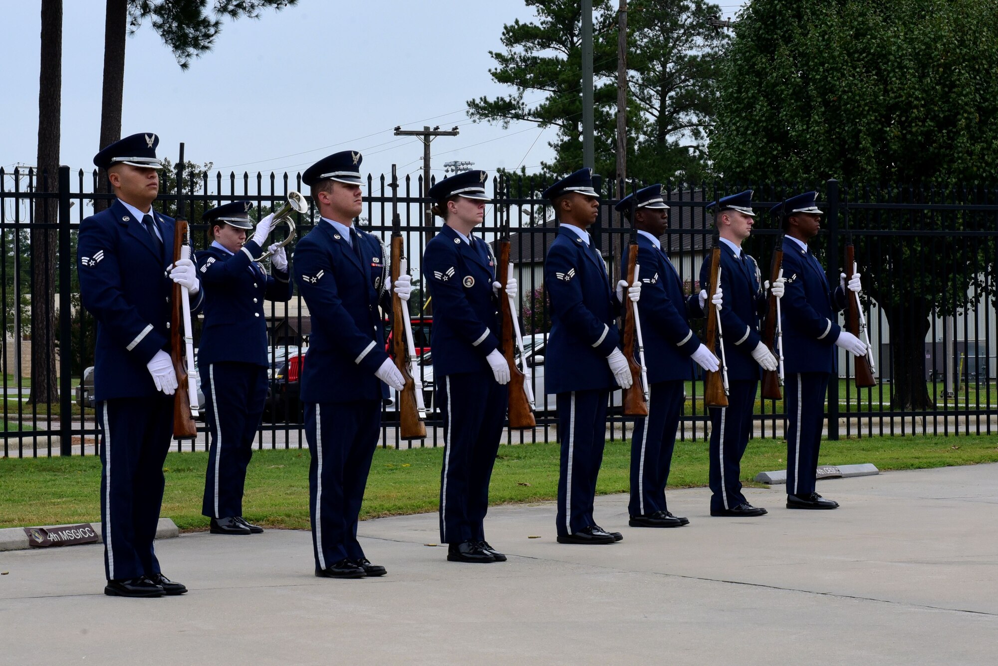 Members of the 4th Fighter Wing honor guard present a 21-gun salute and a bugle playing of TAPS during a 9/11 Remembrance Ceremony, Sept. 11, 2017, at Seymour Johnson Air Force Base, North Carolina. Approximately 100 base members came to pay their respects during the ceremony. (U.S. Air Force photo by Airman 1st Class Victoria Boyton)