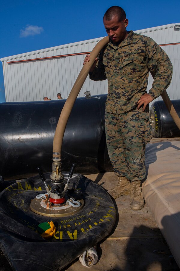 Gulfport, MISS. – A KC 130J, belonging to Marine Aerial Refueler Transport Squadron 234, 4th Marine Aircraft Wing, Marine Forces Reserve, receives fuel at the Million Air Fixed Base Operator, Gulfport, Miss., in preparation to deliver fuel to a forward arming and refueling point in Key West, Florida. Marines with VMGR-234 delivered fuel to a FARP established by Marine Wing Support Squadron 473, 4th MAW, MARFORRES,  in the aftermath of Hurricane Irma, providing over 29,000 pounds of fuel for aircraft conducting resupply, and search and rescue operations in one delivery. (U.S. Marine Corps Photo by Cpl. Imari J. Dubose/Released)