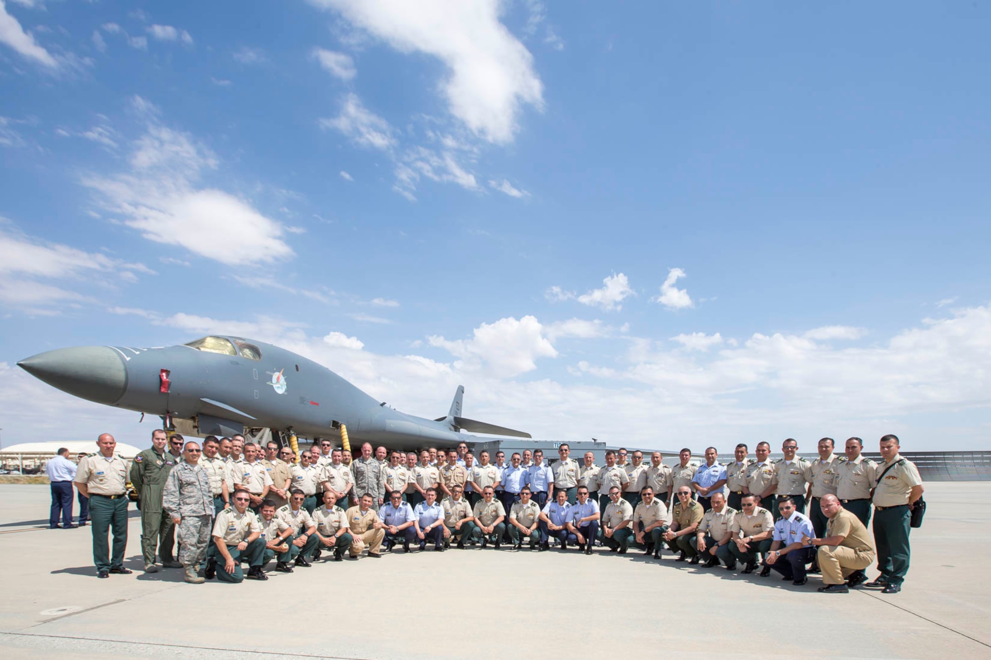 Members of the Republic of Colombia's military pose for a photo in front of a B-1B Lancer as part of their visit to Edwards Sept. 12. (U.S. Air Force photo by Christopher Okula)