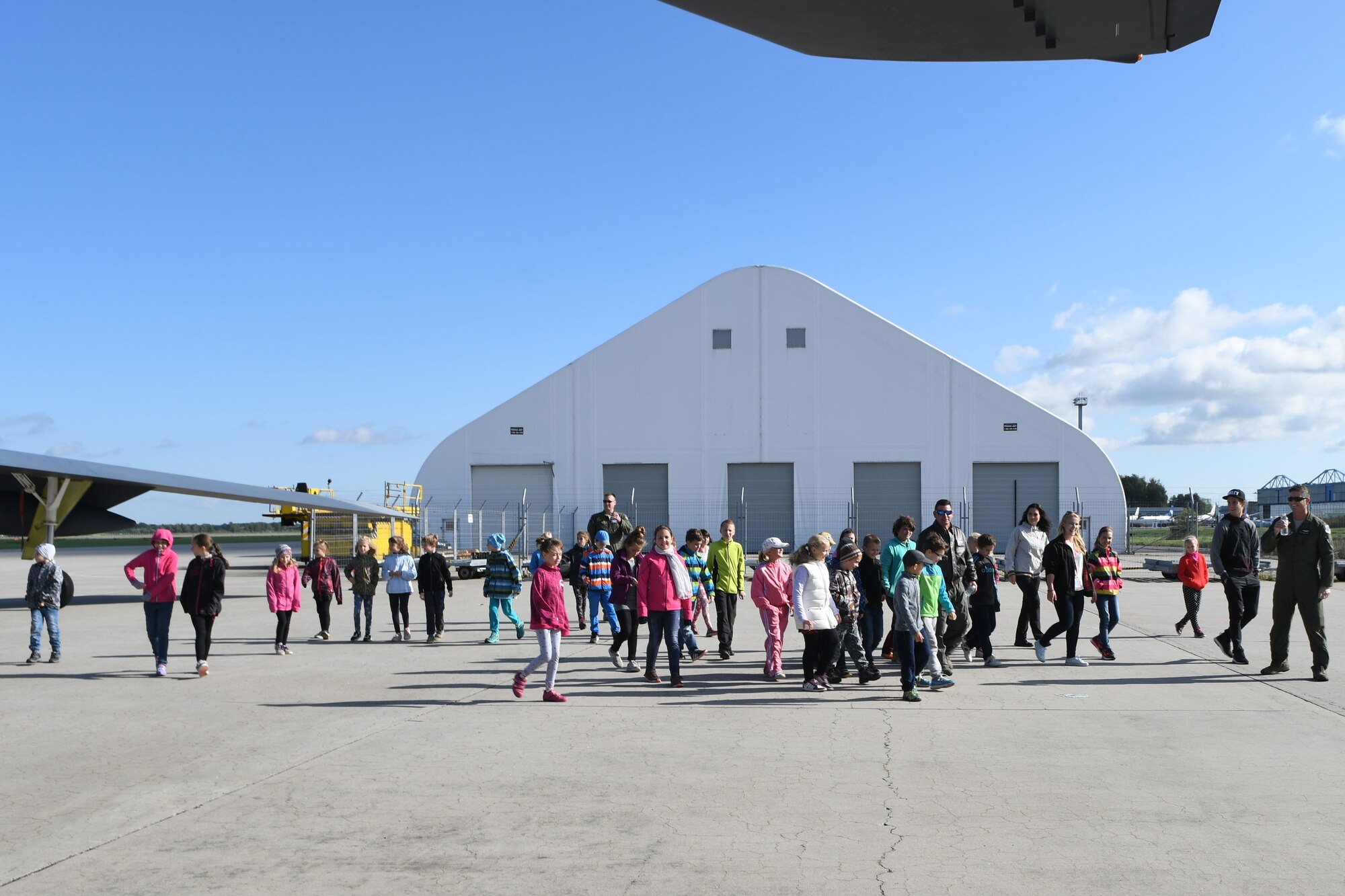 Students from the local area arrive to get an up close look at three aircraft during a school tour at the Leoš Janáček Ostrava Airport, Czech Republic, Sept. 13, 2017.