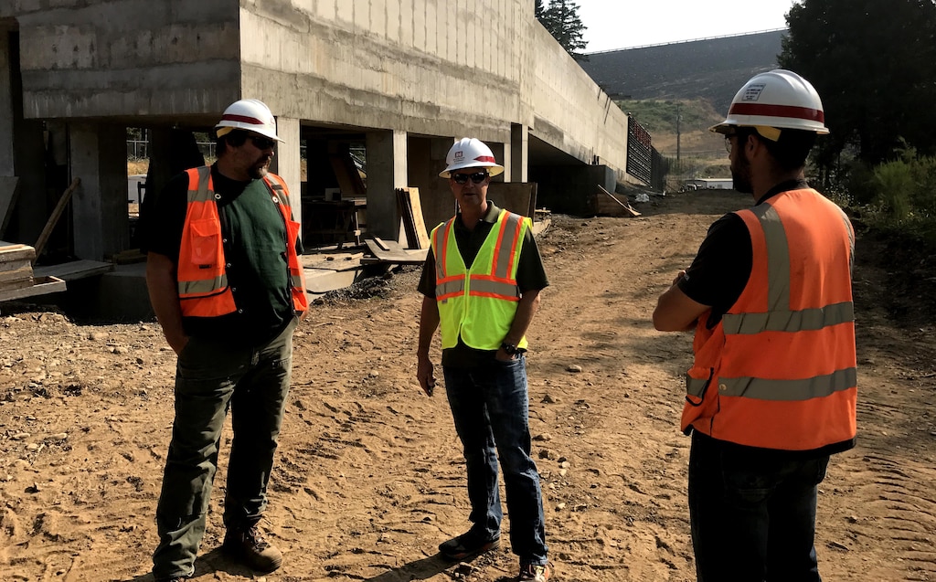 Construction crews prepare for the next concrete pour on the fish ladder for a new fish facility at Fall Creek Dam and Reservoir. 

Construction QAs Duncan Newberry and Nick Myron (Engineering and Construction) speak with OPM Erik Petersen.