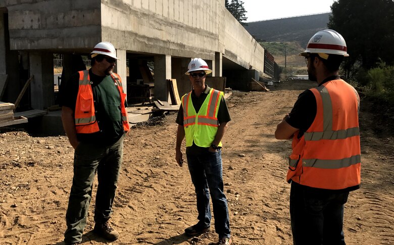 Construction crews prepare for the next concrete pour on the fish ladder for a new fish facility at Fall Creek Dam and Reservoir. 

Construction QAs Duncan Newberry and Nick Myron (Engineering and Construction) speak with OPM Erik Petersen.