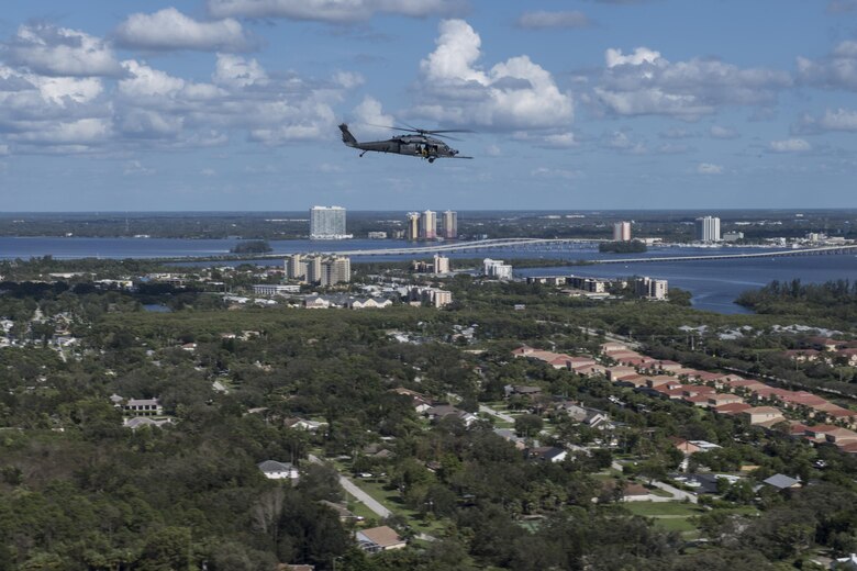 An HH-60G Pave Hawk assigned to the 66th Rescue Squadron searches for anyone needing rescued, Sept. 12, 2017, over the skies of Florida. The 563d Rescue Group prepositioned aircraft and personnel for rescue operations in support of FEMA and U.S. Northern Command after Hurricane Irma made landfall in Florida. (U.S. Air Force photo by Tech. Sgt. Zachary Wolf)