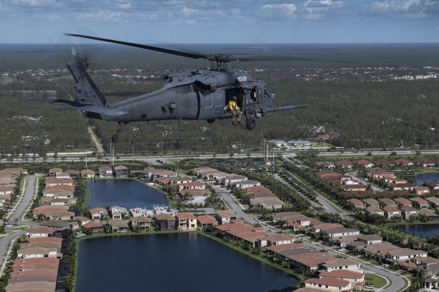 An HH-60G Pave Hawk assigned to the 66th Rescue Squadron searches for anyone needing rescued, Sept. 12, 2017, over the skies of Florida. The 563d Rescue Group prepositioned aircraft and personnel for rescue operations in support of FEMA and U.S. Northern Command after Hurricane Irma made landfall in Florida. (U.S. Air Force photo by Tech. Sgt. Zachary Wolf)