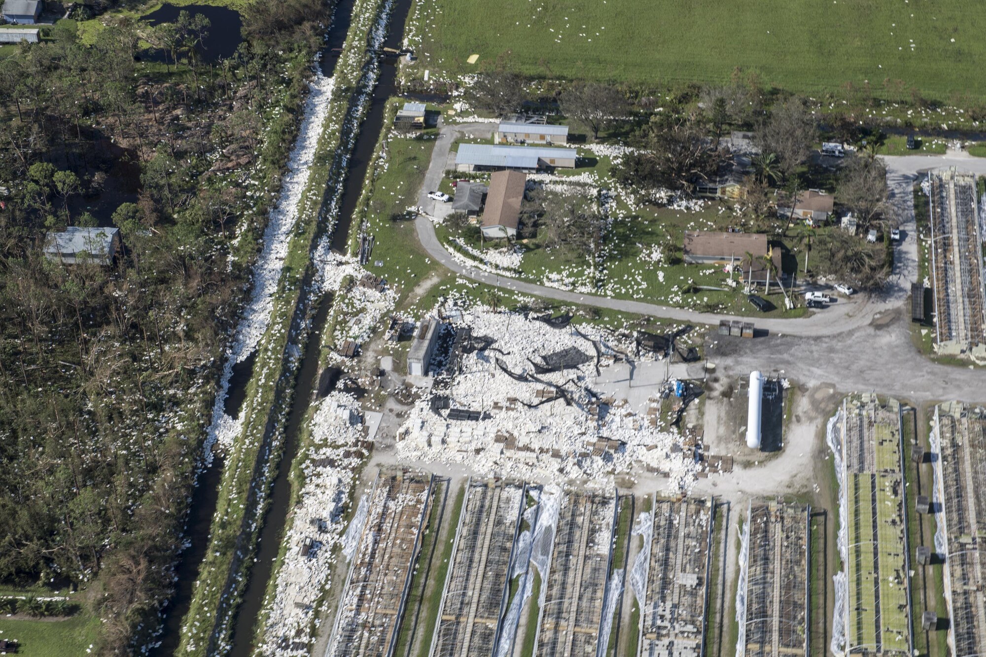 Many buildings and houses show damage from Hurricane Irma, Sept. 13, 2017, in Florida. The 563d Rescue Group prepositioned aircraft and personnel for rescue operations after Hurricane Irma made landfall in Florida. (U.S. Air Force photo by Tech. Sgt. Zachary Wolf)