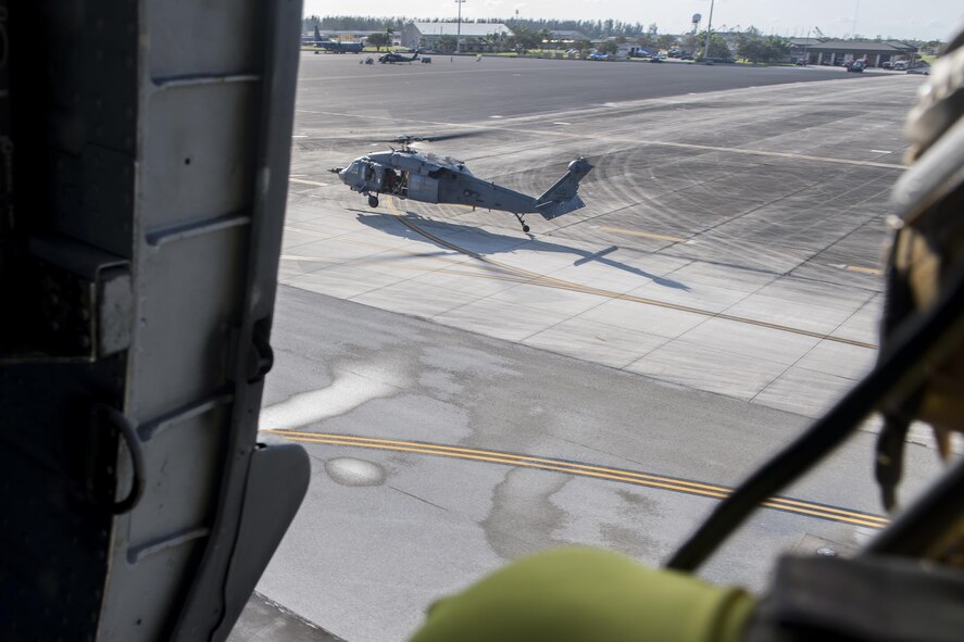 An HH-60G Pave Hawk assigned to the 66th Rescue Squadron lands, Sept. 12, 2017, at Homestead Air Reserve Base, Fla. The 563d Rescue Group prepositioned aircraft and personnel for rescue operations in support of FEMA and U.S. Northern Command after Hurricane Irma made landfall in Florida. (U.S. Air Force photo by Tech. Sgt. Zachary Wolf)