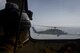 A pararescueman assigned to the 48th Rescue Squadron, watches as an HC-130J Combat King II fuels an HH-60G Pave Hawk, Sept. 12, 2017, over the skies of Florida. The 563d Rescue Group prepositioned aircraft and personnel for rescue operations in support of FEMA and U.S. Northern Command after Hurricane Irma made landfall in Florida. (U.S. Air Force photo by Tech. Sgt. Zachary Wolf)