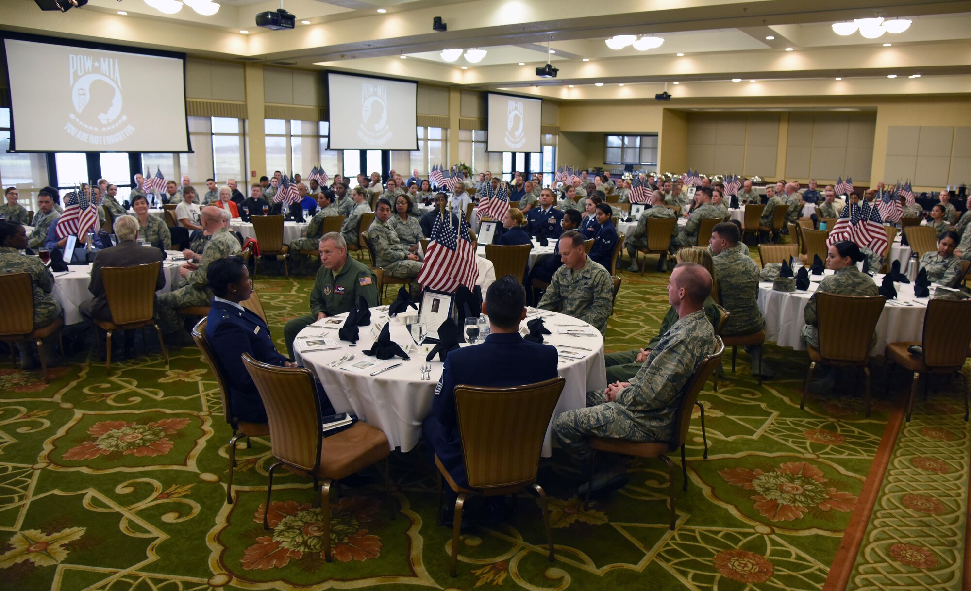 Keesler personnel attend a POW/MIA Remembrance Luncheon at the Bay Breeze Event Center Sept. 13, 2017, on Keesler Air Force Base, Miss. The event, hosted by the Air Force Sergeants Association, was held to raise awareness and pay tribute to all prisoners of war and military members still missing in action. (U.S. Air Force photo by Kemberly Groue)