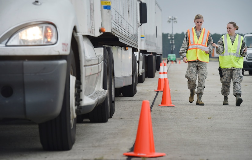 First Lt. Savannah Emmrich, left, 43rd Air Base Squadron fuels management officer in charge, and Senior Airman Haley Bradshaw, right, 43rd ABS personnelist, both assigned to Pope Army Airfield, N.C., finish logging information for a truck carrying goods prepped to support Hurricane Irma relief efforts at Joint Base Charleston’s North Auxiliary Airfield, S.C., Sept. 13, 2017. The airfield acts as a receiving and distribution staging area for goods and commodities being transported to hurricane victims here and areas to the southeast over the next few weeks. Airmen of the 43rd Air Mobility Operations Group and U.S. Department of Homeland Security - Federal Emergency Management Agency (FEMA), are working side-by-side executing relief efforts. (U.S. Air Force photo by Staff Sgt. Christopher Hubenthal)