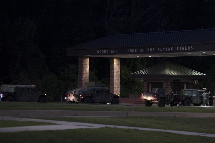 U.S. Army National Guard members from Joint Task Force 781st Chemical, Biological, Radiological, Nuclear and Explosive Response Package drive on to Moody Air Force Base, Ga., Sept. 12, 2017. Units from the 48th Infantry Brigade Combat Team and JTF 781st CERFP stayed the night at Moody before heading to Orlando, Fla., to provide humanitarian relief for the victims of Hurricane Irma. (U.S. Air Force photo by Staff Sgt. Eric Summers Jr.)