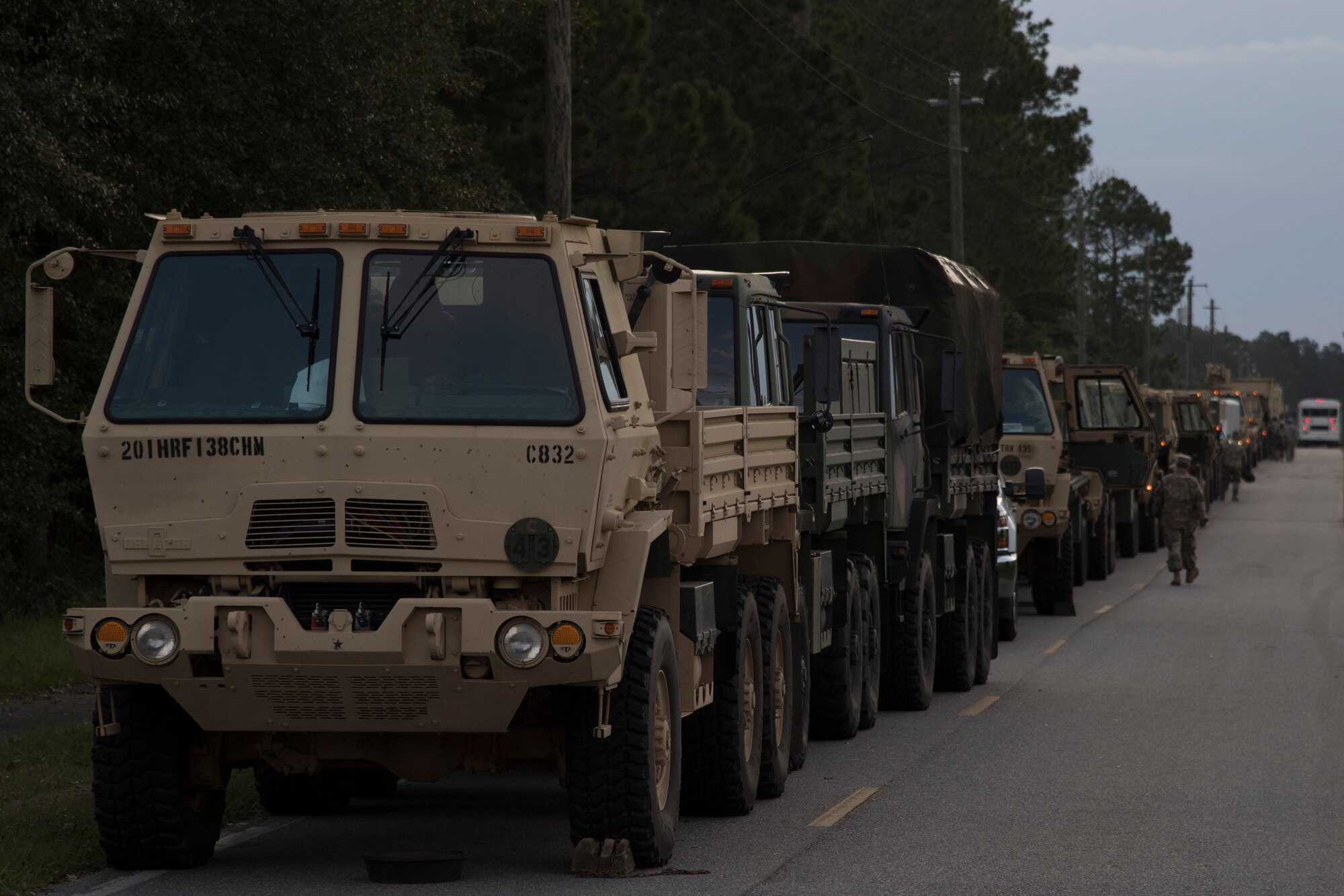 U.S. Army National Guard vehicles from Joint Task Force 781st Chemical, Biological, Radiological, Nuclear and Explosive Response Package and 48th Infantry Brigade Combat Team park along Stone Road, Sept., 12, 2017, at Moody Air Force Base, Ga. Units from the 48th IBCT and JTF 781st CERFP stayed the night at Moody before heading to Orlando, Fla., to provide humanitarian relief for the victims of Hurricane Irma. (U.S. Air Force photo by Staff Sgt. Eric Summers Jr.)