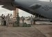 Passengers retrieve their luggage on the flightline at Homestead Air Reserve Base, Fla. Sept. 12, 2017. These passengers included civil engineer and public affairs personnel to assist with hurricane relief operations. (U.S. Air Force photo/Staff Sgt. Andrew Park)