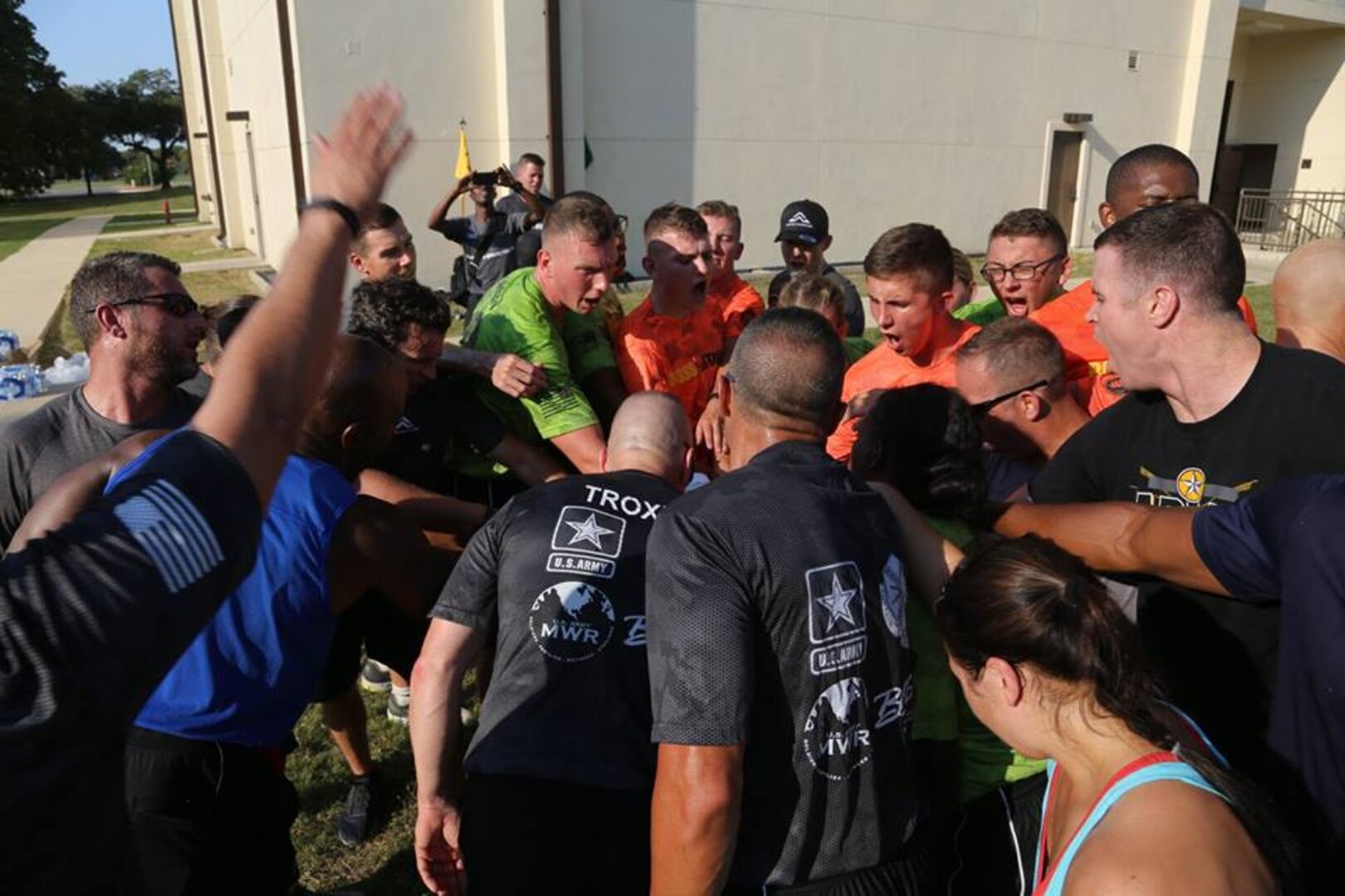 CSM Troxell brings the squad in for a joint cheer at the completion of the PT.