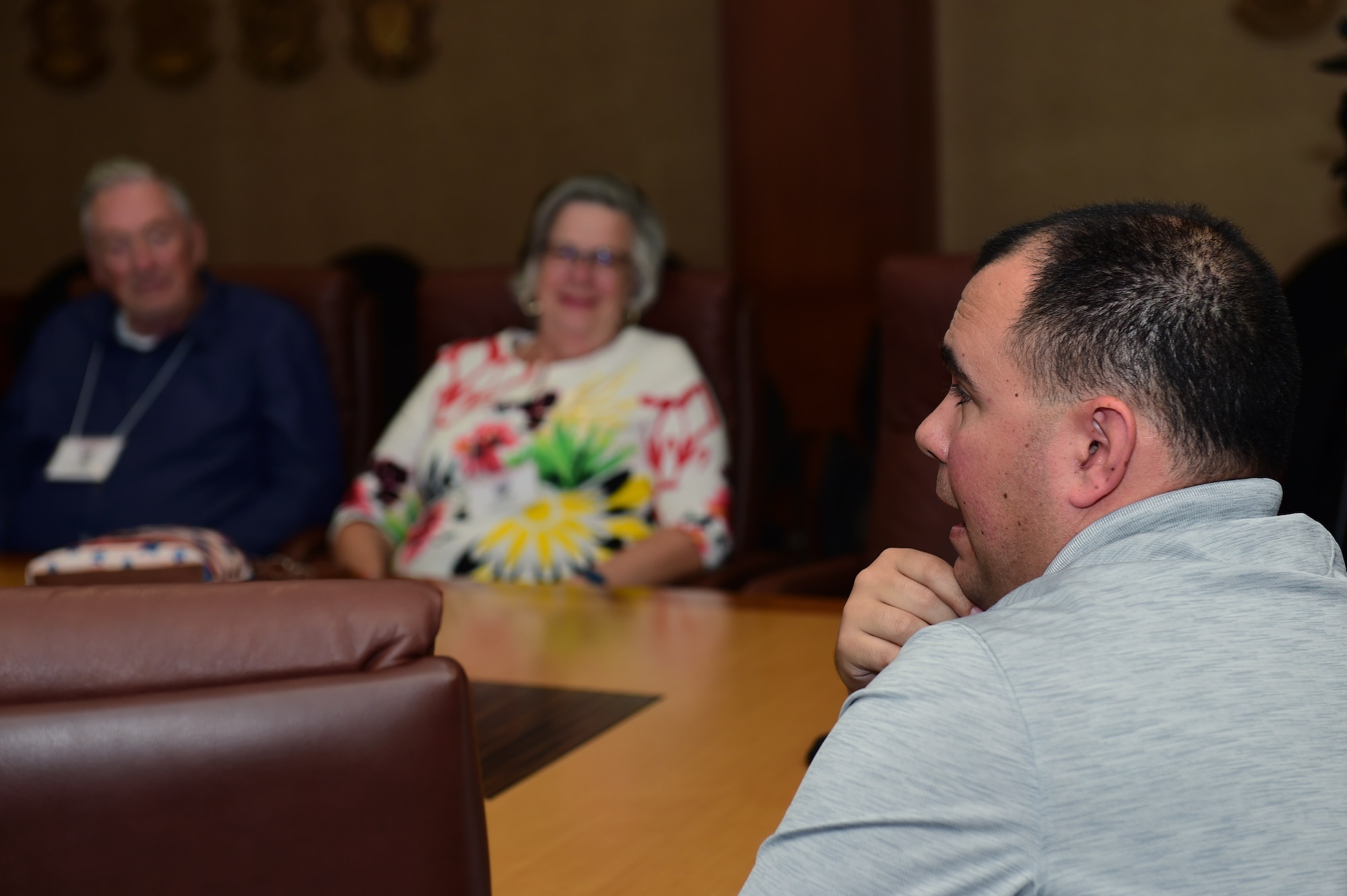 Christopher McCune, 460th Space Wing historian, speaks with members of the Tan Son Nhut Association Sept. 14, 2017, in the 460th SW Headquarters building on Buckley Air Force Base, Colo.