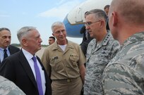 Secretary of Defense Jim Mattis (center) is greeted by U.S. Air Force Gen. John. E. Hyten, commander of U.S. Strategic Command (USSTRATCOM), upon his arrival at Offutt Air Force Base, Neb., Sept. 13, 2017.
