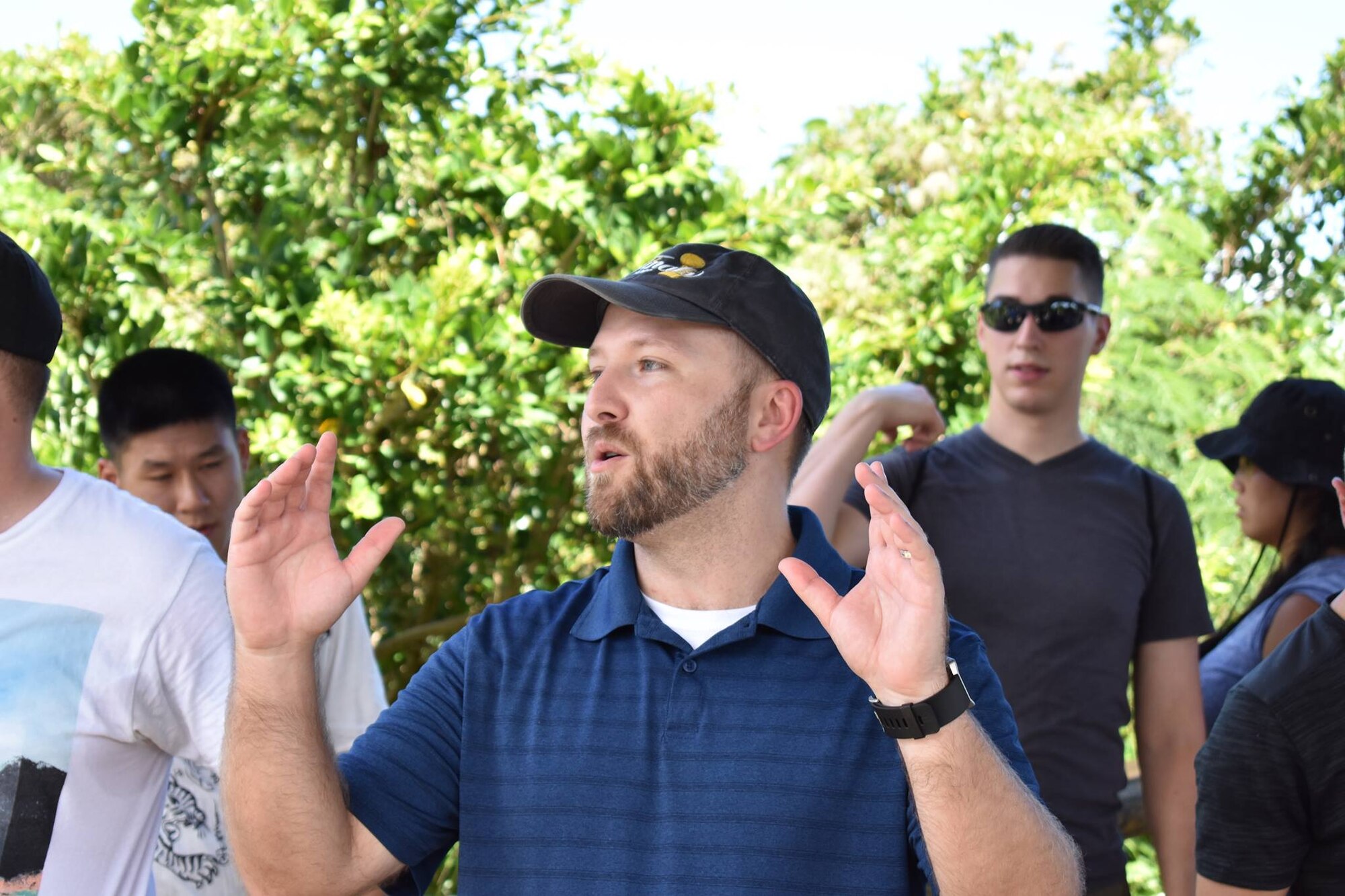 Brett Manis, 18th Wing chief historian, speaks to Airmen about the historical significance of visiting Hacksaw Ridge Aug. 25, 2017, at Urasoe, Japan. Airmen from Kadena Air Base visited Hacksaw Ridge to learn more about military history during the Battle of Okinawa in World War II. (Courtesy photo)