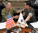 BUSAN, Republic of Korea (Sept. 14, 2017) Vice Adm. Phil Sawyer, commander, U.S. Seventh Fleet, and Vice Adm. Jung, Jin-Sup, commander, Republic of Korea (ROK) Fleet, shake hands after signing a memorandum of understanding that strengthens the relationship between the U.S. and ROK navies. Sawyer's visit included meetings with U.S. and ROK military leaders as well as the signing of a component-level MOU with the ROK navy to enhance coordination and training in support of the U.S.- ROK Alliance.