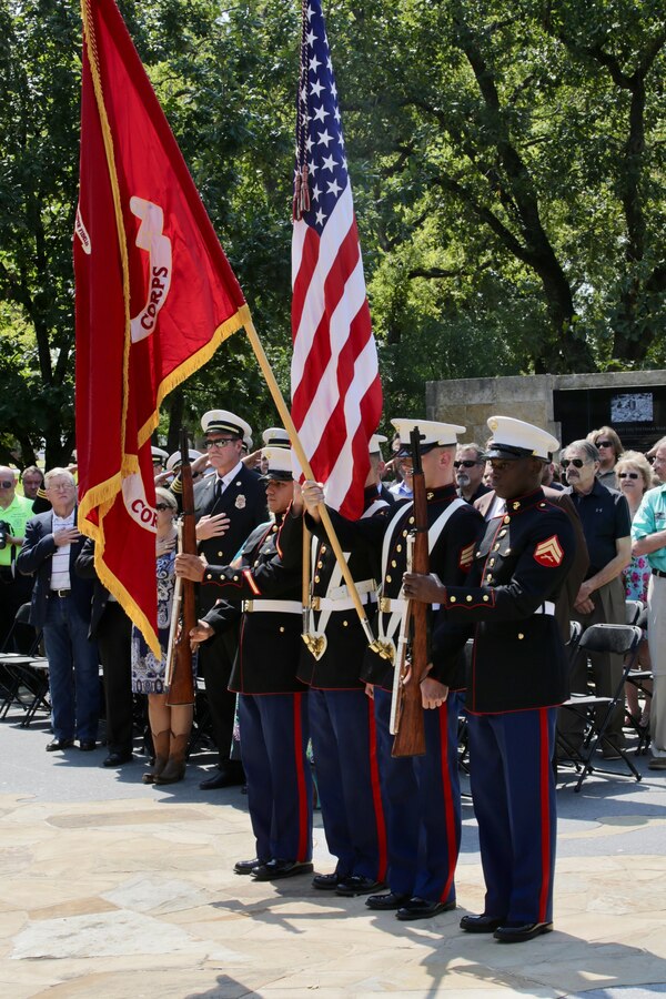 A U.S. Marine Corps color guard from 8th Marine Corps District, Marine Corps Recruiting Command, participates in a Navy Cross ceremony for retired Staff Sgt. Eric M. Smith in Irving, TX, Sept. 14. Smith was awarded the Navy Cross for his courageous actions in 2004 while serving as a squad leader with Company E, Second Battalion, Fourth Marine Regiment, First Marine Division, in support of Operation Iraqi Freedom. Smith currently serves as a lieutenant paramedic with the Irving Fire Department. The Navy Cross is the second highest military decoration that may be awarded to a member of the United States Navy, U.S. Marine Corps, (and to members of the Coast Guard when operating under the authority of the Department of the Navy). It is awarded for extraordinary heroism. (U.S. Marine Corps photo by Sgt. Courtney G. White)