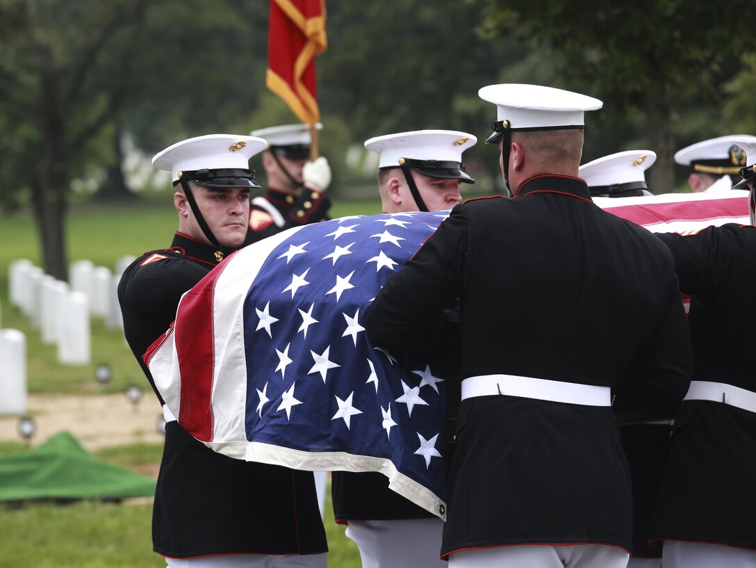 Marine Corps Body Bearers with Bravo Company, Marine Barracks Washington D.C., carry a casket during a full honors funeral at Arlington National Cemetery, Va., Sept. 13, 2017. Marine Barracks Washington is home to the Marines who provide support for all Marine Corps funerals and many high-ranking government officials funerals within the Capitol area. (Official U.S. Marine Corps photo by Lance Cpl. Damon Mclean/Released)