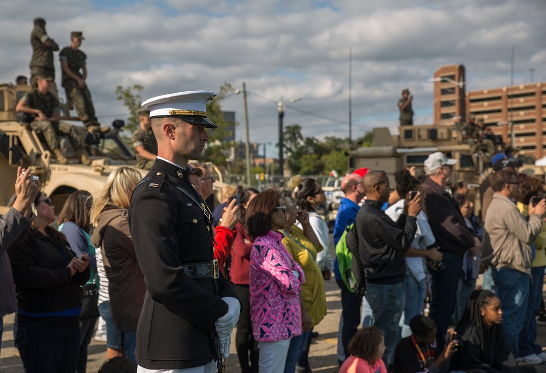 Captain Gregory Jurschak, platoon commander, U.S. Marine Corps Silent Drill Platoon, stands at a ceremonial position during a performance at the static display section of Marine Week, Detroit, MI. Sept. 9, 2017. Marine Week, hosted by the Marine Corps in one city per year, is a celebration of community, country and Corps that allows the public to connect with Marines through live-demonstrations, hands-on static displays and several other interactive events. (Official U.S. Marine Corps photo by Cpl. Robert Knapp/Released)