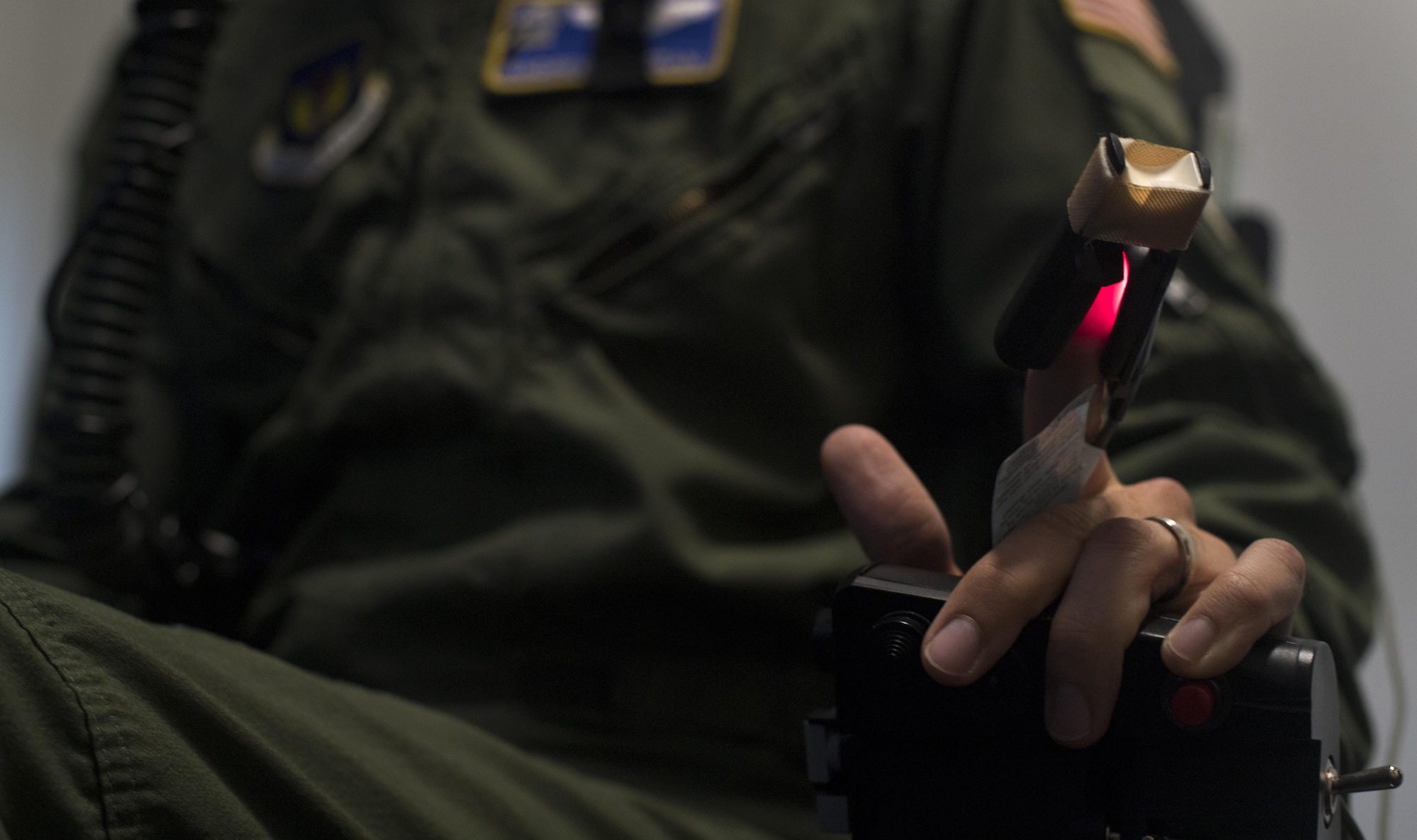 A U.S. Air Force 86th Operations Support Squadron pilot operates a simulated aircraft while hooked up to the 86th Aerospace Medicine Squadron Aerospace Physiology’s reduced oxygen breathing device on Ramstein Air Base, Germany, Sept. 13, 2017. Air crew personnel flying over 10,000 feet have a higher risk of experiencing hypoxia, the lack of oxygen at high altitudes, and the ROBD familiarizes crewmembers with the affects so they are prepared to handle them while flying.  (U.S. Air Force photo by Senior Airman Tryphena Mayhugh)