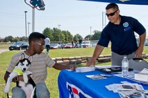U.S. Air Force Reserve Senior Airman Eddie Higgins, an air transportation specialist assigned to the 96th Aerial Port Squadron, nominates his employer for a “Patriot Award” with the help of Brian Anible, employer outreach director Arkansas, Employer Support of the Guard and Reserve, during the Annual 913th Airlift Group’s “Family Day” celebration at Little Rock Air Force Base, Ark., Sept. 10, 2017. Master Sgt. Anible is also the First Sergeant for the 188th Mission Support Group, Arkansas Air National Guard. (U.S. Air Force photo by Master. Sgt. Jeff Walston/Released)