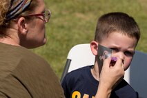 Brantley Mailhiot gets his face painted during the 913th Airlift Group’s “Family Day” celebration at Little Rock Air Force Base, Ark., Sept. 10, 2017. Brantley is the son of Kevin and Amy Mailhiot. Kevin is a U.S. Air Force Reserve staff sergeant and air transportation technician assigned to the 96th Aerial Port Squadron. (U.S. Air Force photo by Master. Sgt. Jeff Walston/Released)
