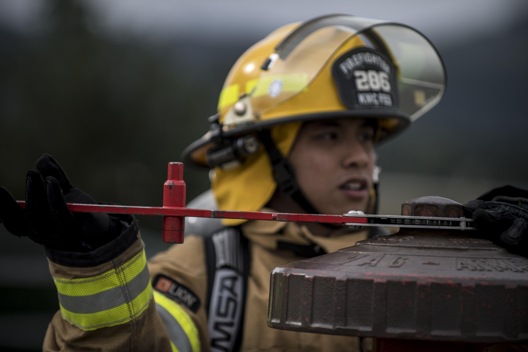 U.S. Air Force Airman 1st Class Elijah Molina, 86th Civil Engineer Squadron firefighter, operates a hydrant for re-servicing operations during annual aircraft live fire training at the 86th Civil Engineer Squadron Fire and Emergency Services Training Area on Ramstein Air Base, Germany, Sept. 14, 2017.