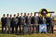 Airman Leadership School Class 17-F stands before the T-6 Texan static plane display on Goodfellow Air Force Base, Texas, Aug. 31, 2017. ALS is a six-week course designed to prepare senior airmen to assume supervisory duties, offering instruction in leadership and followership, written and oral communication skills, and the profession of arms. (U.S. Air Force photo by Airman 1st Class Randall Moose/Released)