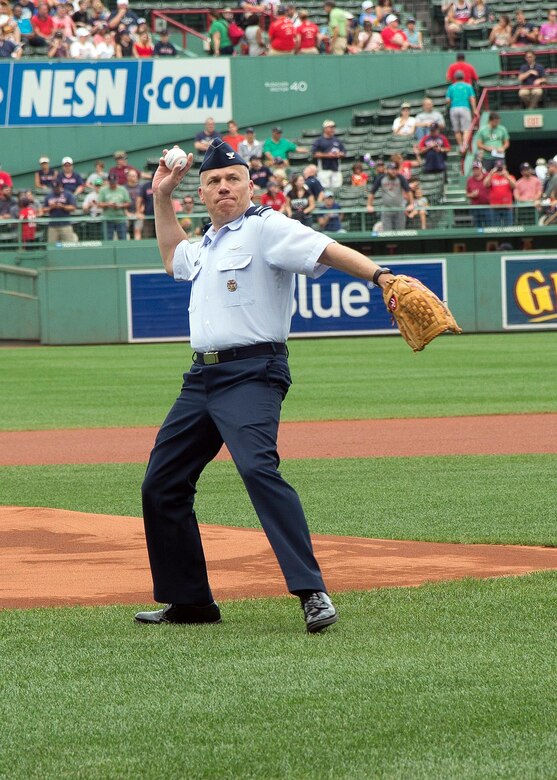 Hund throws first pitch