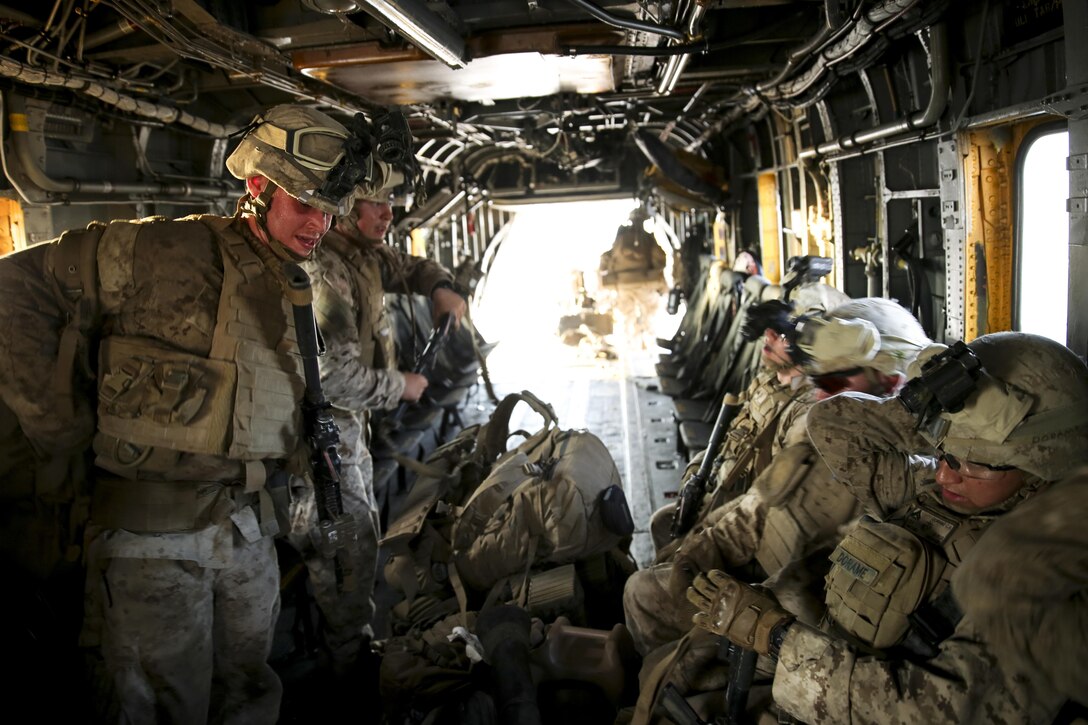 Infantry Marines with 5th Marine Regiment, 1st Marine Division, board a CH-53E with Marine Heavy Helicopter Squadron (HMH) 466 to conduct a battalion insert during exercise Summer Fury at Naval Air Facility El Centro, Calif., Aug. 4. Summer Fury, a weeklong training evolution, tested several squadrons within 3rd Marine Aircraft Wing on the skills required of them during a combat deployment. (U.S. Marine Corps photo by Sgt. Kimberlyn Adams/Released)
