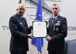 Retired Col. Tim Tarchick, the presiding official, left, and Col. Larry E. Tyer Jr., 94th Airlift Wing inspector general, pose with Tyer's certificate of retirement at Dobbins Air Reserve Base, Ga. Sept. 10, 2017. He officially retires on Oct. 1, 2017 after 30 years of service - 25 of which were spent here at Dobbins. (U.S. Air Force photo/Senior Airman Justin Clayvon)