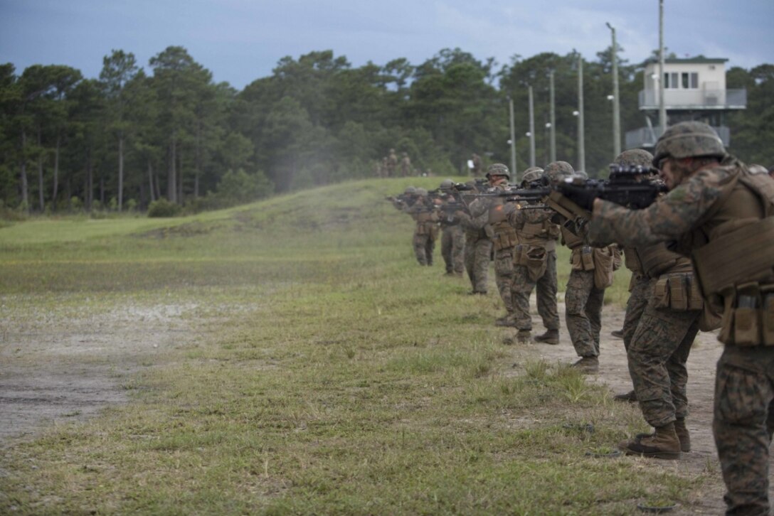 Marines fire at close-range targets during a combat marksmanship program at Camp Lejeune, N.C., Aug 31, 2017. The Marines took part in the routine qualification to maintain their combat skills for mission readiness. The Marines are with 2nd Light Armored Reconnaissance Battalion. (U.S. Marine Corps photo by Pfc. Nicholas Guevara)