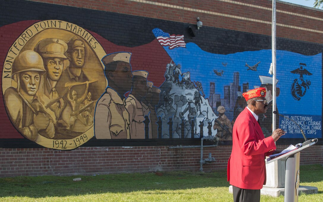Lamar Harrington, commandant of Montford Point Marine Detachment 158, addresses the crowd at the Mural Unveiling ceremony during Marine Week Detroit, Sept. 9, 2017. Marine Week Detroit is an opportunity to connect with the people of the greater Detroit area, and thank them for their support. (U.S. Marine Corps photo by Lance Cpl. Danny Gonzalez)