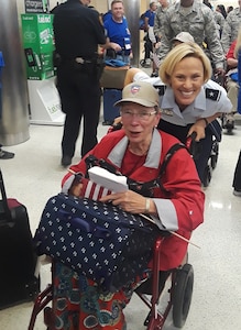 Brig. Gen. Heather Pringle, commander, 502nd Air Base Wing and Joint Base San Antonio, and Lt. Eleanor C. Bjoring, an Air Force nurse during the Korean War, at the homecoming ceremonies of Honor Flight San Antonio flight 007 at the San Antonio International Airport.