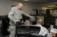 Senior Master Sgt. Jeffrey Hamilton, 436 Airlift Wing Command and Control Operations superintendent, monitors a digital log Sept. 13, 2017, in the Command Post on Dover Air Force Base, Del. C2 Operations Airmen are responsible for notifying commanders and installation personnel of changing safety conditions. (U.S. Air Force photo by Staff Sgt. Aaron J. Jenne)