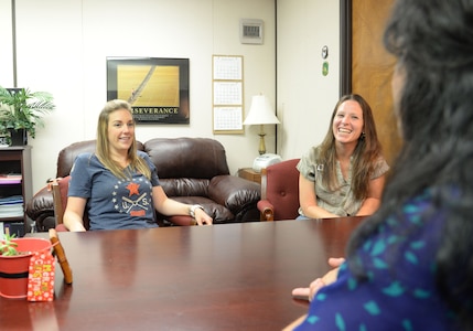 Ms. Nikki Kelly is a gold star family member, here she is photographed with Mrs. Kathleen Moore, chief of Airman Family Readiness Center and Mrs. Crisselda Smith, community readiness consultant at the AFRC office August 4, 2017 at Joint Base San Antonio-Randolph, Texas. Kelly traveled from Houston to acquire her base access pass with the assistance of the AFRC staff.