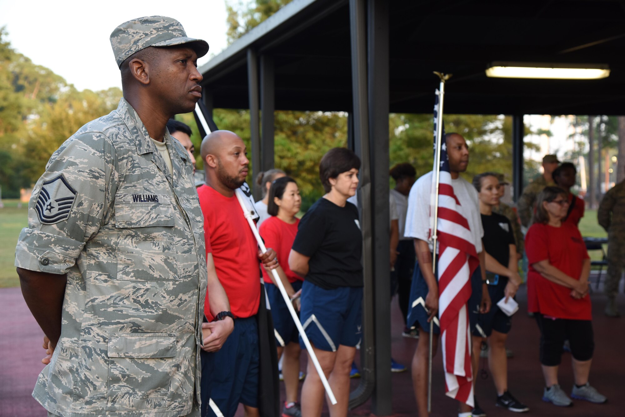 Master Sgt. Clarence Williams, 81st Surgical Operations Squadron operating room flight chief, and Keesler personnel attend Keesler’s POW/MIA 24-hour memorial run and vigil at the Crotwell Track Sept. 14, 2017, on Keesler Air Force Base, Mississippi. The event was held to raise awareness and pay tribute to all prisoners of war and those military members still missing in action. (U.S. Air Force photo by Kemberly Groue)