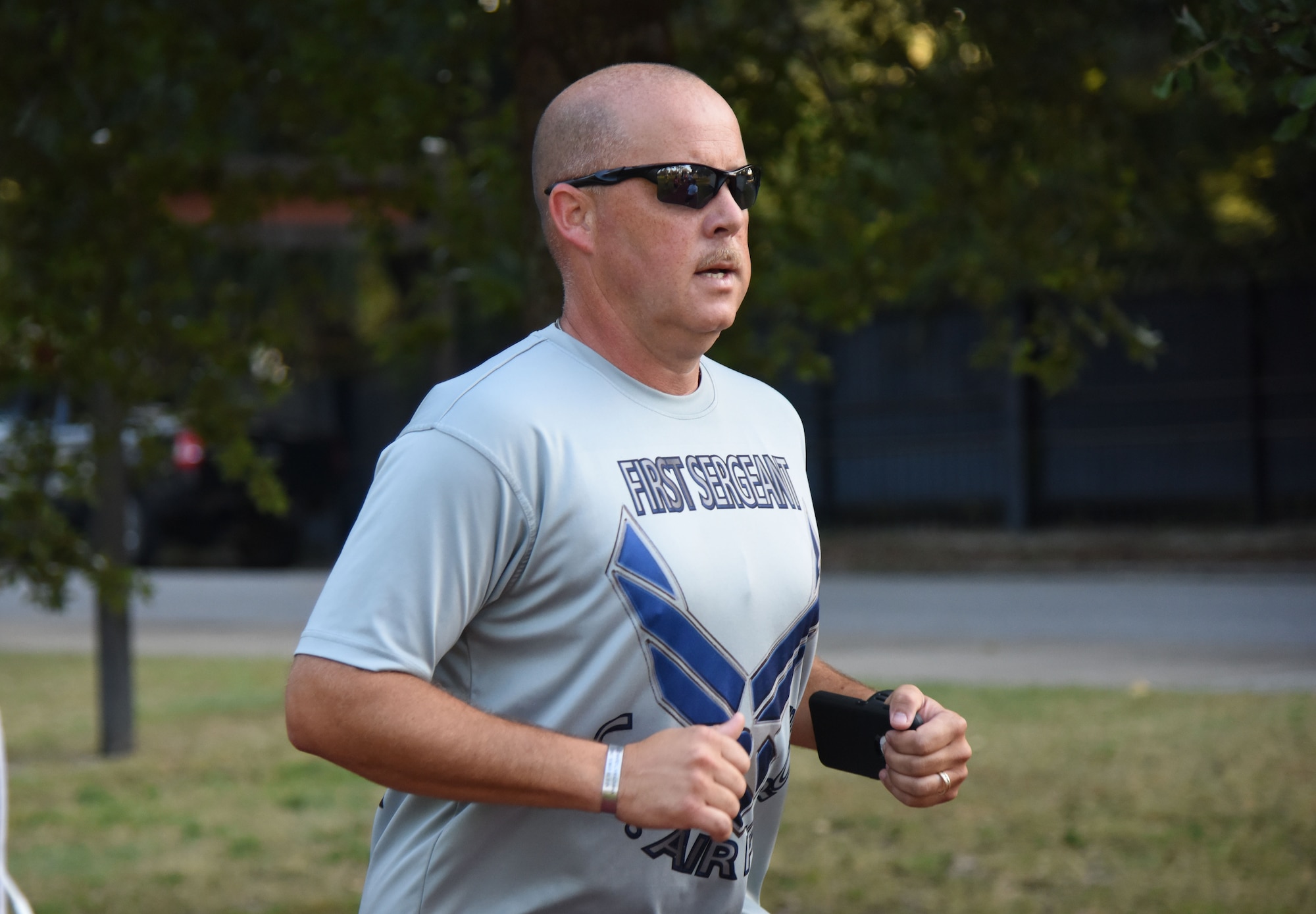 Master Sgt. Joseph Clifford, 336th Training Squadron first sergeant, participates in Keesler’s POW/MIA 24-hour memorial run and vigil at the Crotwell Track Sept. 14, 2017, on Keesler Air Force Base, Mississippi. The event was held to raise awareness and pay tribute to all prisoners of war and those military members still missing in action. (U.S. Air Force photo by Kemberly Groue)