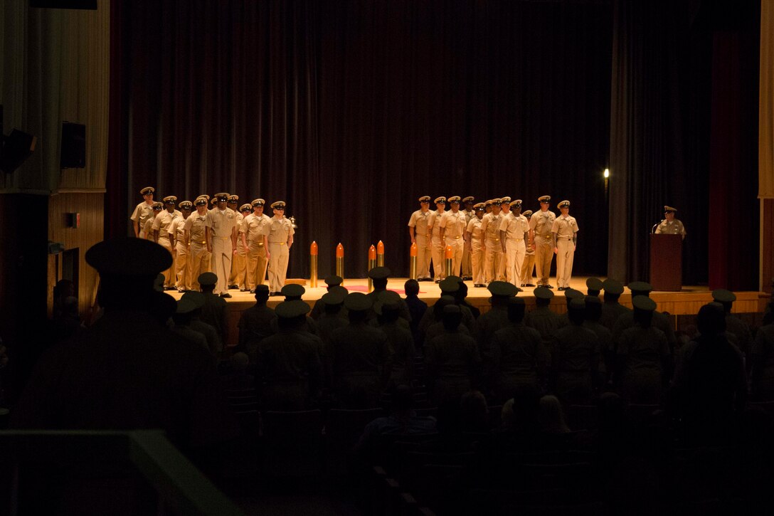 Sailors with 2nd Marine Logistics Group recite the Navy Chief Petty Officer Creed during a chief pinning ceremony at Camp Lejeune, N.C., Sept. 15, 2017. Navy Chief Petty Officers are both technical experts who train newly-commissioned junior officers and leaders whose commands are strictly followed by their subordinates. (U.S. Marine Corps photo by Lance Cpl. Abrey D. Liggins.)