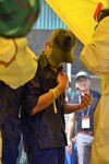 A Vietnamese volunteer undergoes chemical decontamination procedures
during the Aug. 2017 Disaster Management Engagement Activity culminating
exercise alongside their counterparts from Vietnam’s National Committee for Incident, Disaster Response, and Search and Rescue (VINASARCOM) in Hanoi.